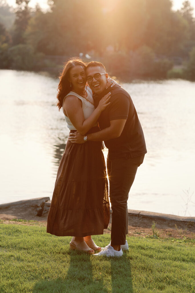 Candid engagement photo in Drake Park near Mirror Pond