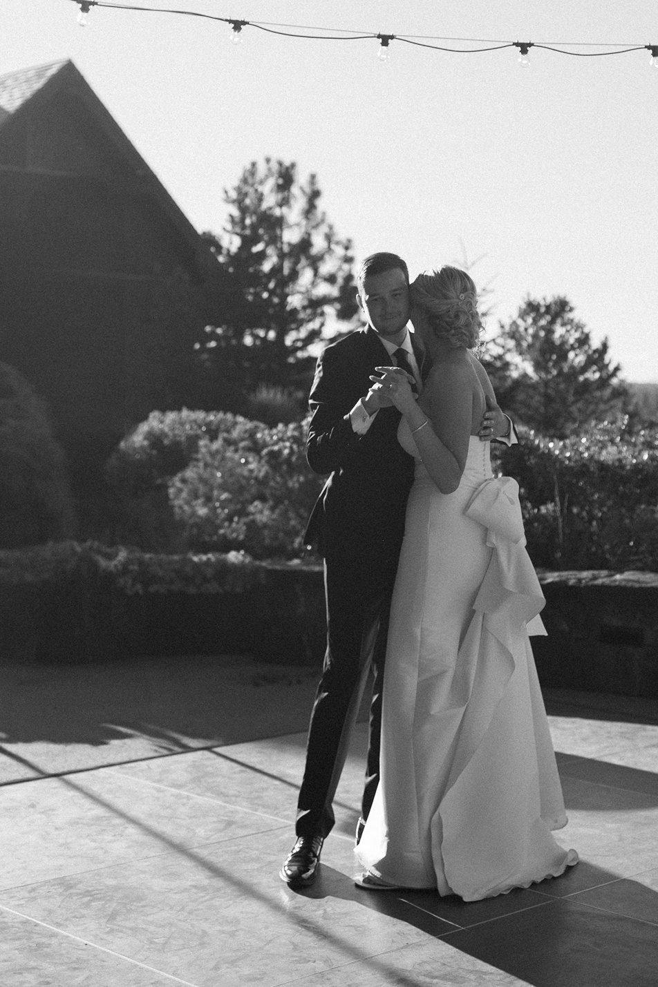 the bride and groom dancing at their reception in central oregon tetherow resort