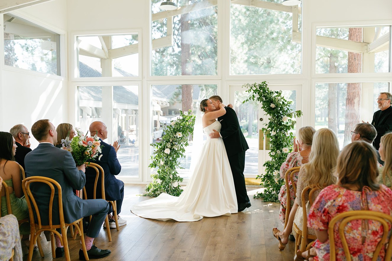the first kiss at a wedding ceremony in central oregon at white aspen creative