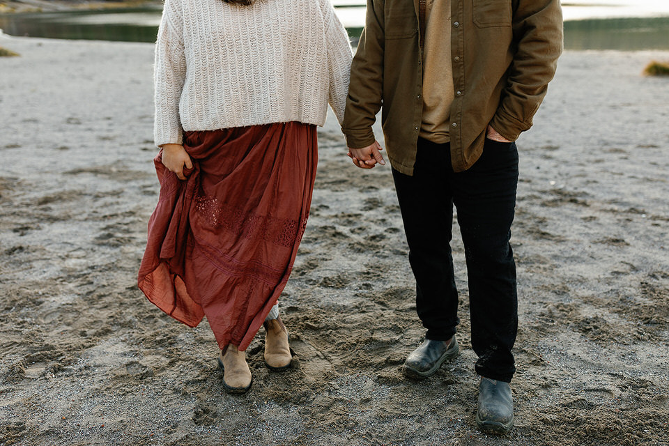 close up photo of couple holding hands